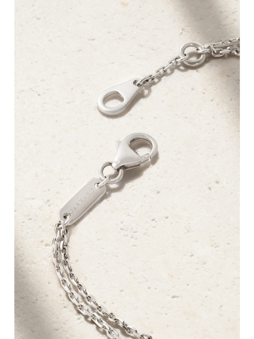 Back view of the Garrard Fanfare Symphony 18-karat White Gold Multi-stone Bracelet