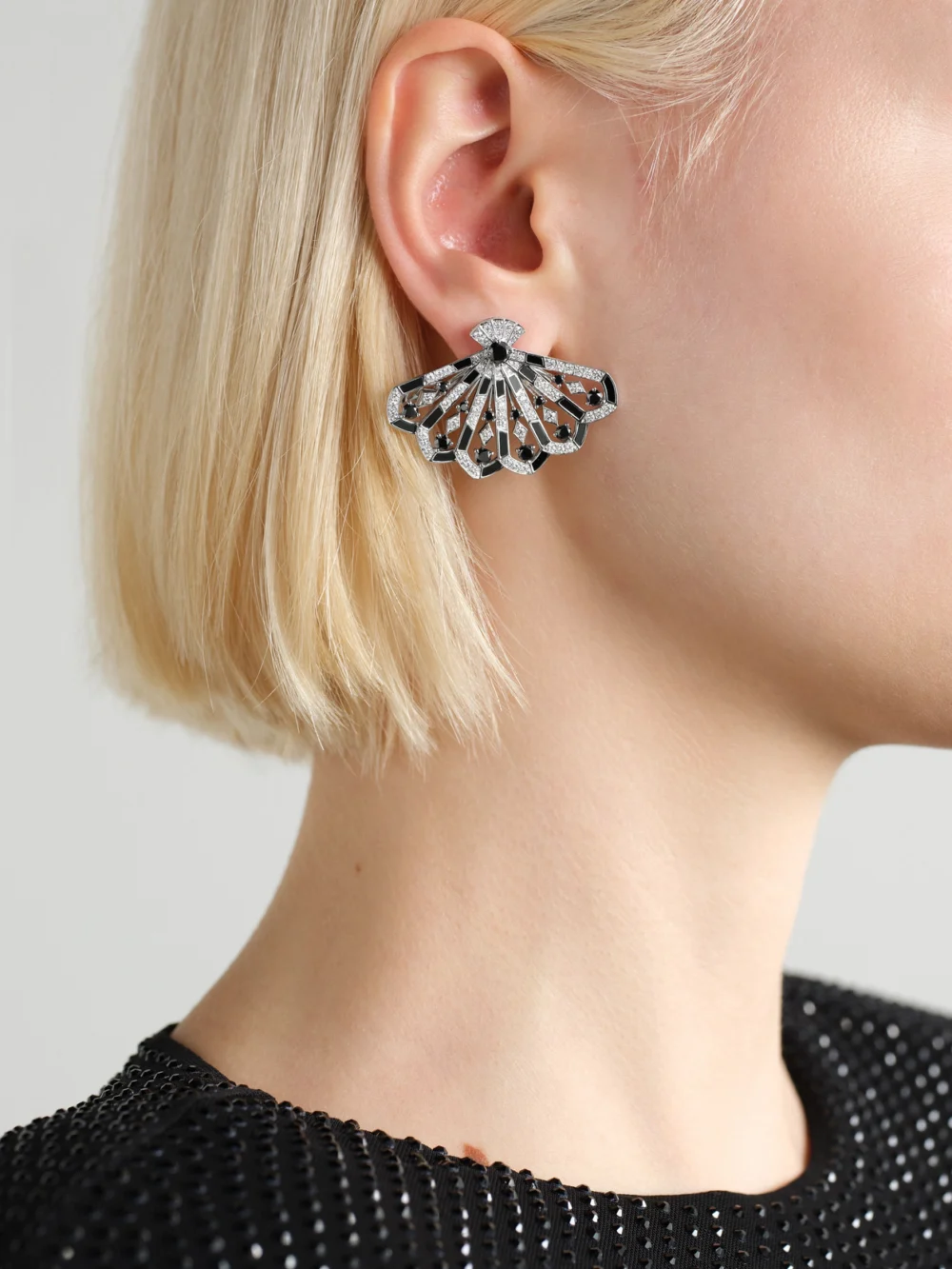 Garrard Fanfare Symphony 18-karat White Gold, Spinel and Diamond Earrings, styled view
