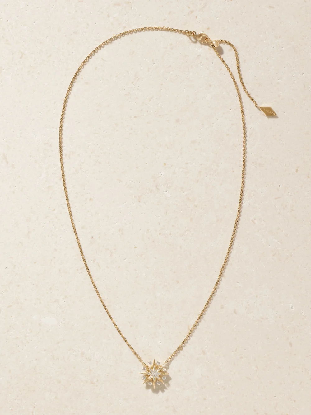 Close-up detail of the Garrard Starlight Mini Icon 18-karat Gold and Diamond Necklace