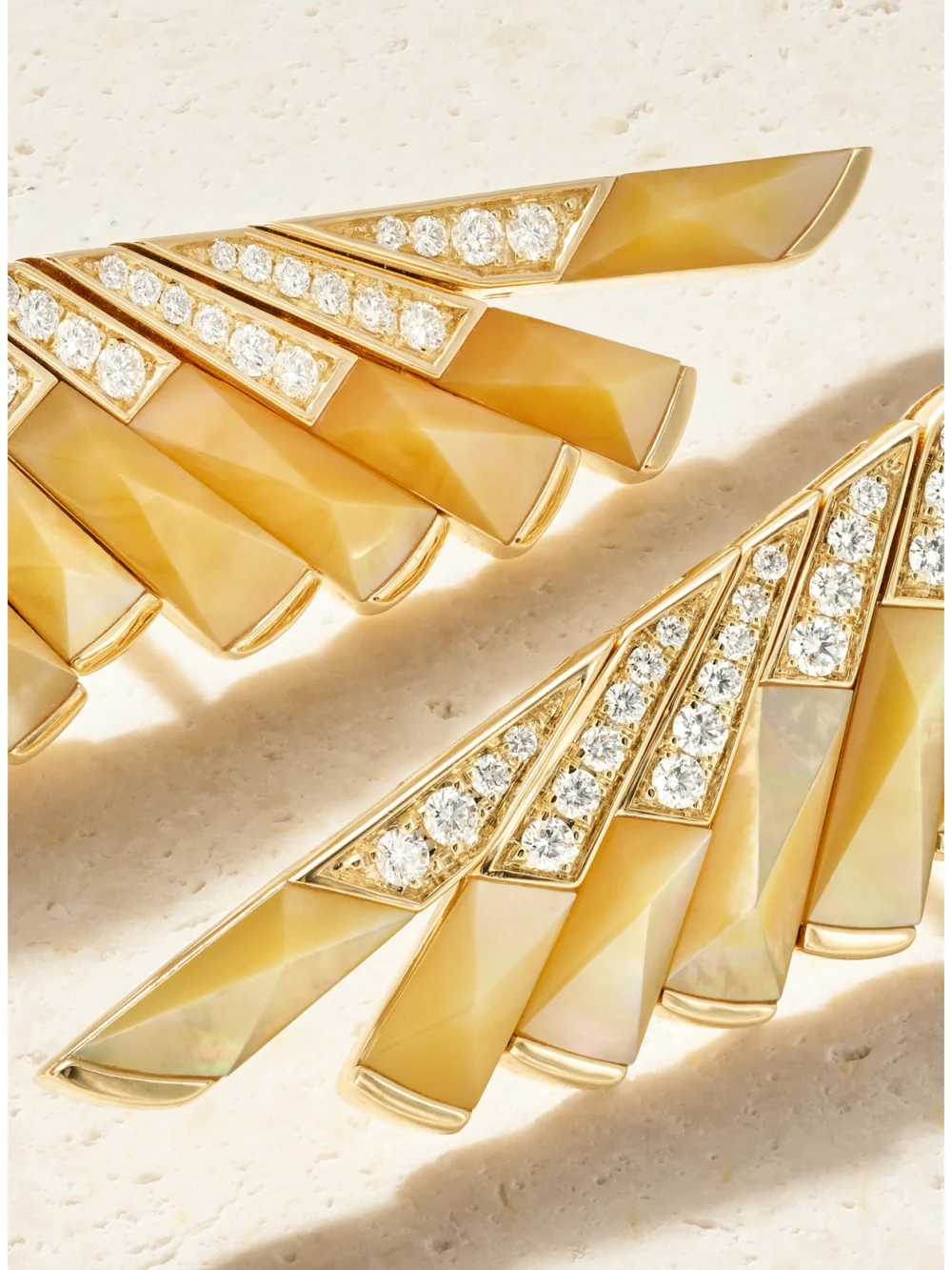 Close-up detail of the Garrard Wings Rising 18-karat Gold, Diamond and Mother-of-pearl Earrings