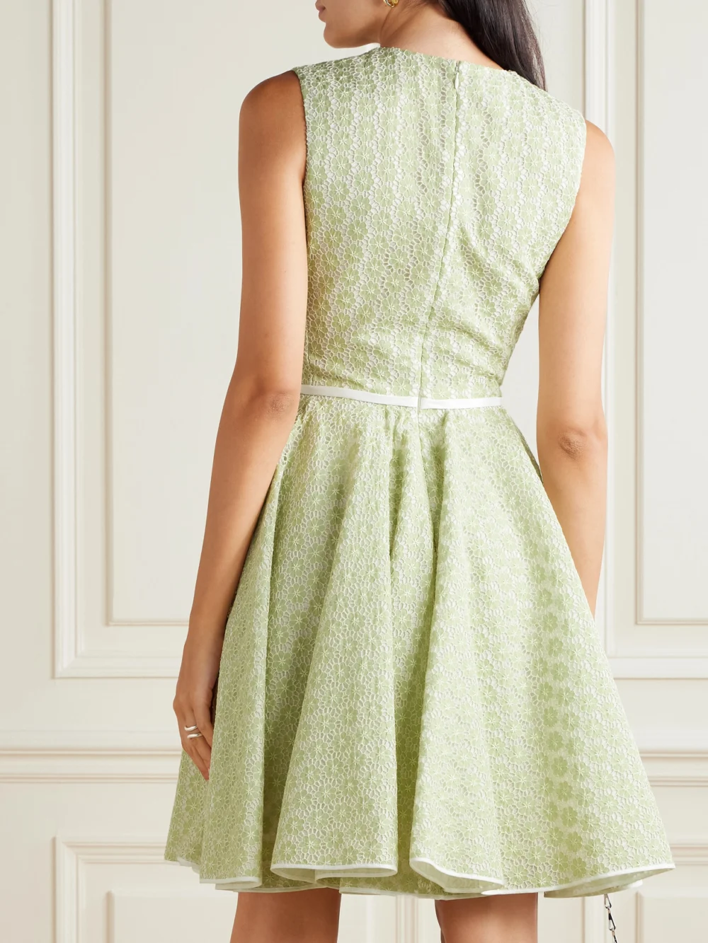 Back view of the Giambattista Valli Belted Bow-embellished Pleated Cotton Guipure Lace Mini Dress