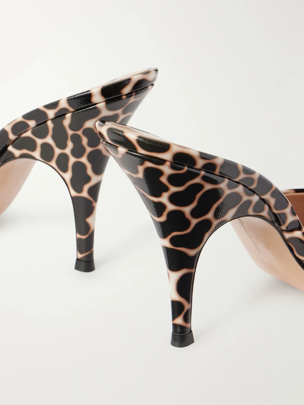 Close-up detail of the Gianvito Rossi 95 Leopard-print Leather Mules