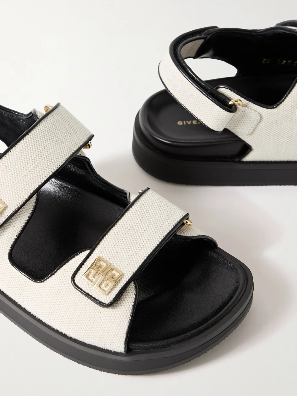 Close-up detail of the Givenchy 4g Logo-embellished Leather-trimmed Canvas Sandals
