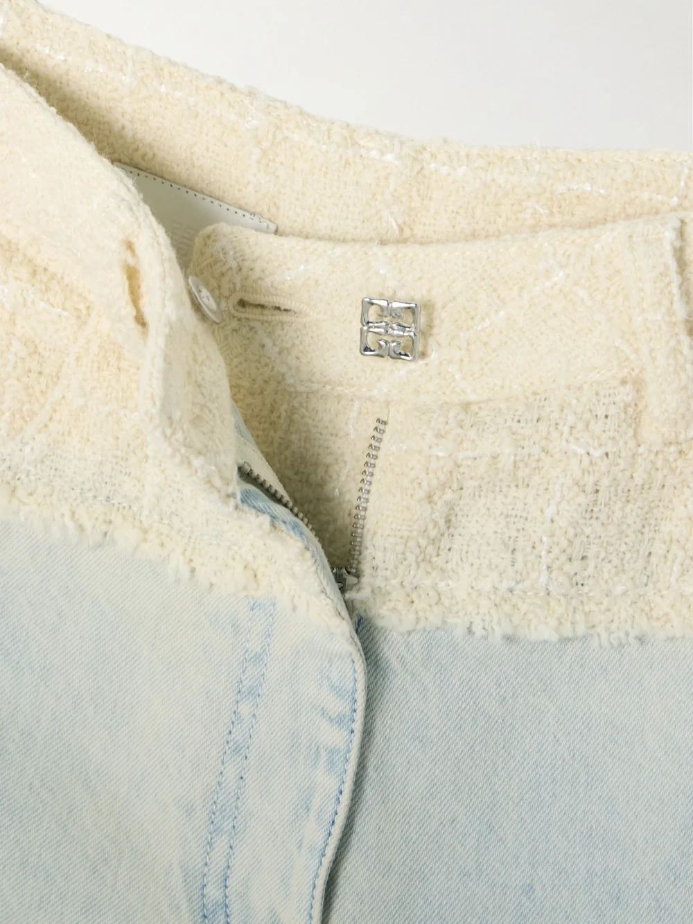 Close-up detail of the Givenchy Big Mix Wool-blend Bouclé-trimmed High-rise Straight-leg Jeans