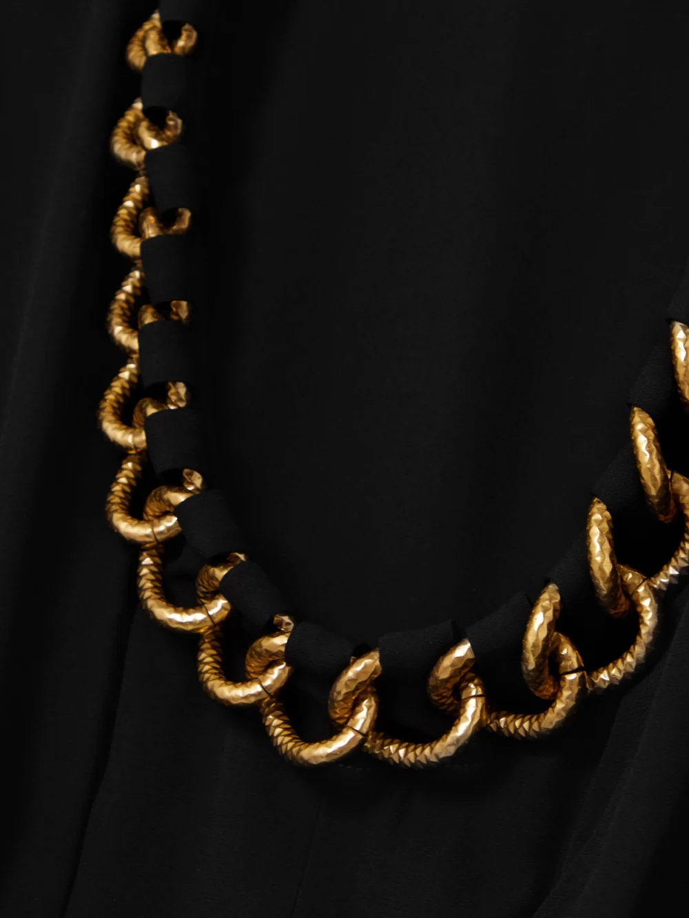 Close-up detail of the Givenchy Chain-embellished Crepe Mini Dress