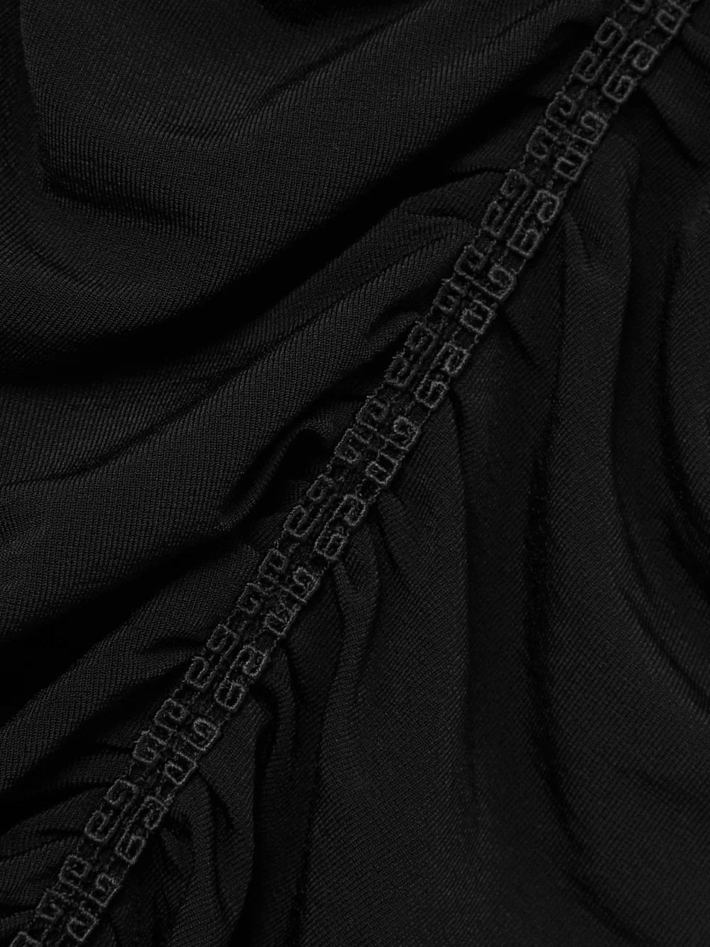 Close-up detail of the Givenchy Cold-shoulder Crochet-trimmed Ruched Stretch-jersey Mini Dress