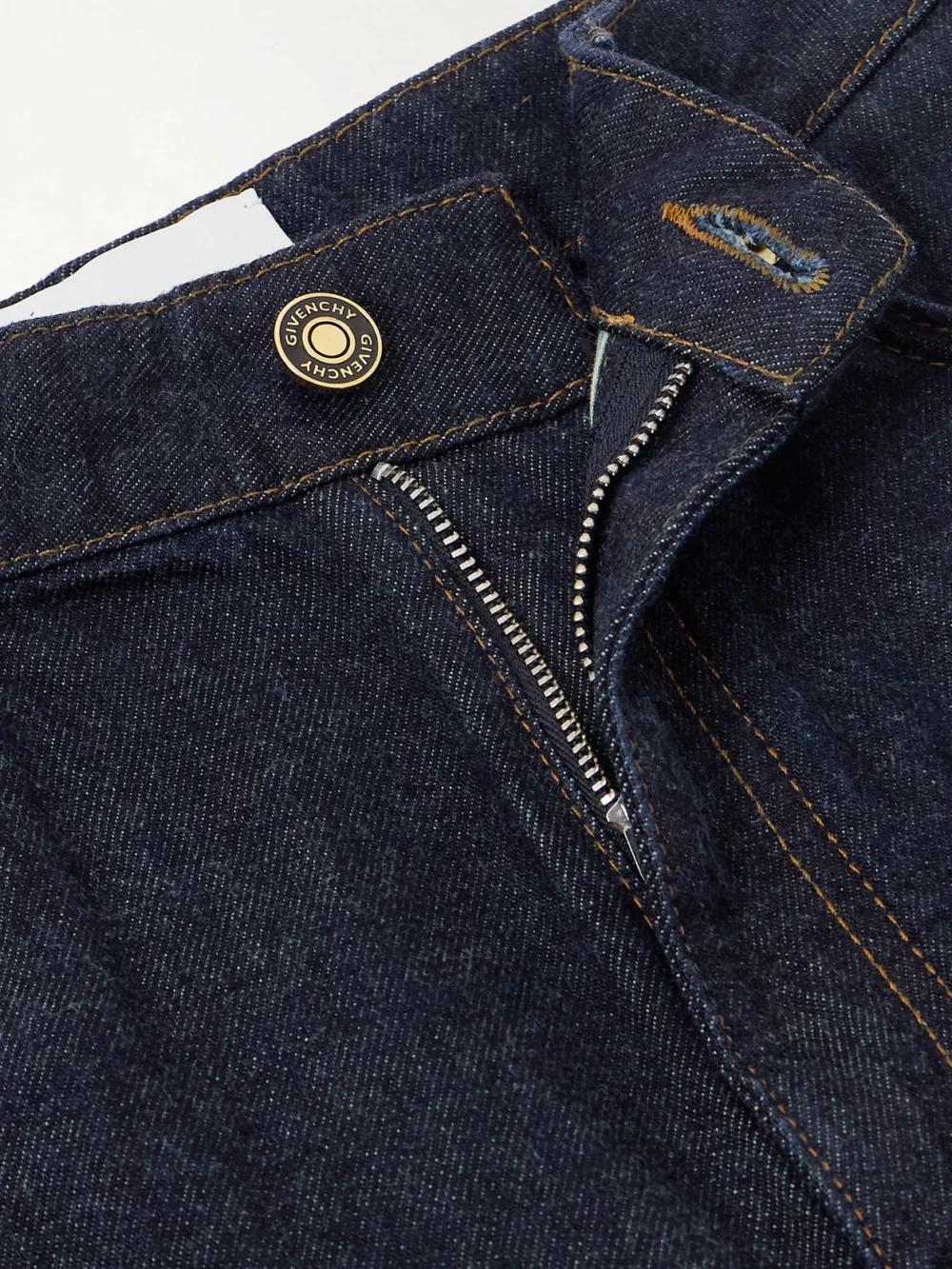 Close-up detail of the Givenchy Cropped High-rise Barrel-leg Jeans