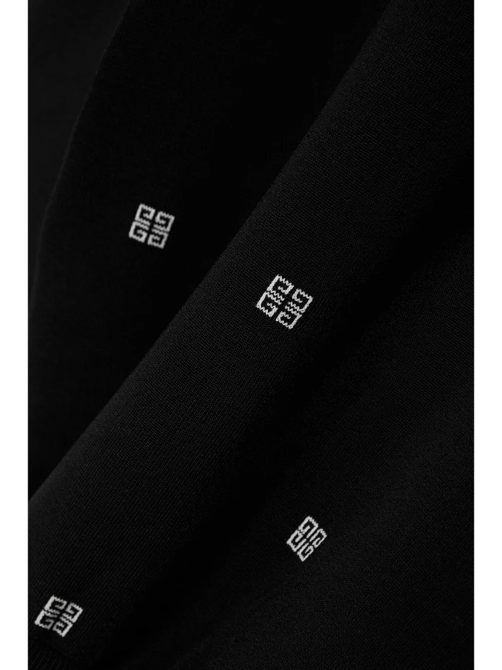 Close-up detail of the Givenchy Cropped Jacquard-knit Sweater