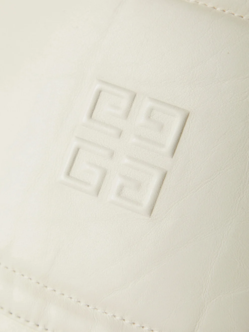 Close-up detail of the Givenchy Cutout Embossed Leather Skirt