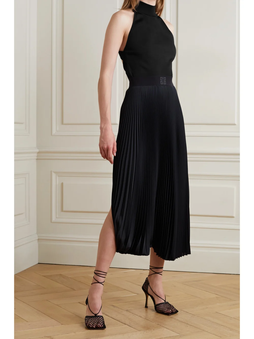 Givenchy Cutout Knitted Turtleneck Top, worn by a model