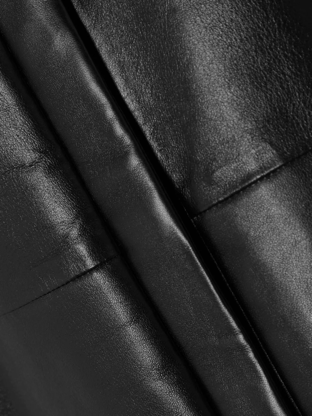 Close-up detail of the Givenchy Cutout Leather Blouse