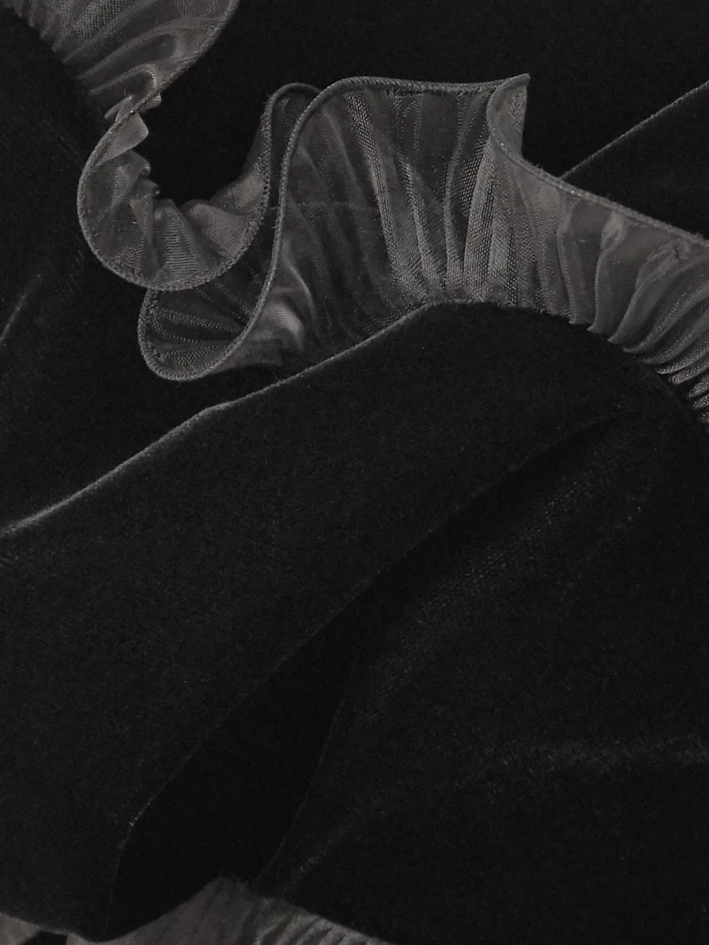 Close-up detail of the Givenchy Cutout Ruffled Plissé Organza-trimmed Velvet Mini Dress