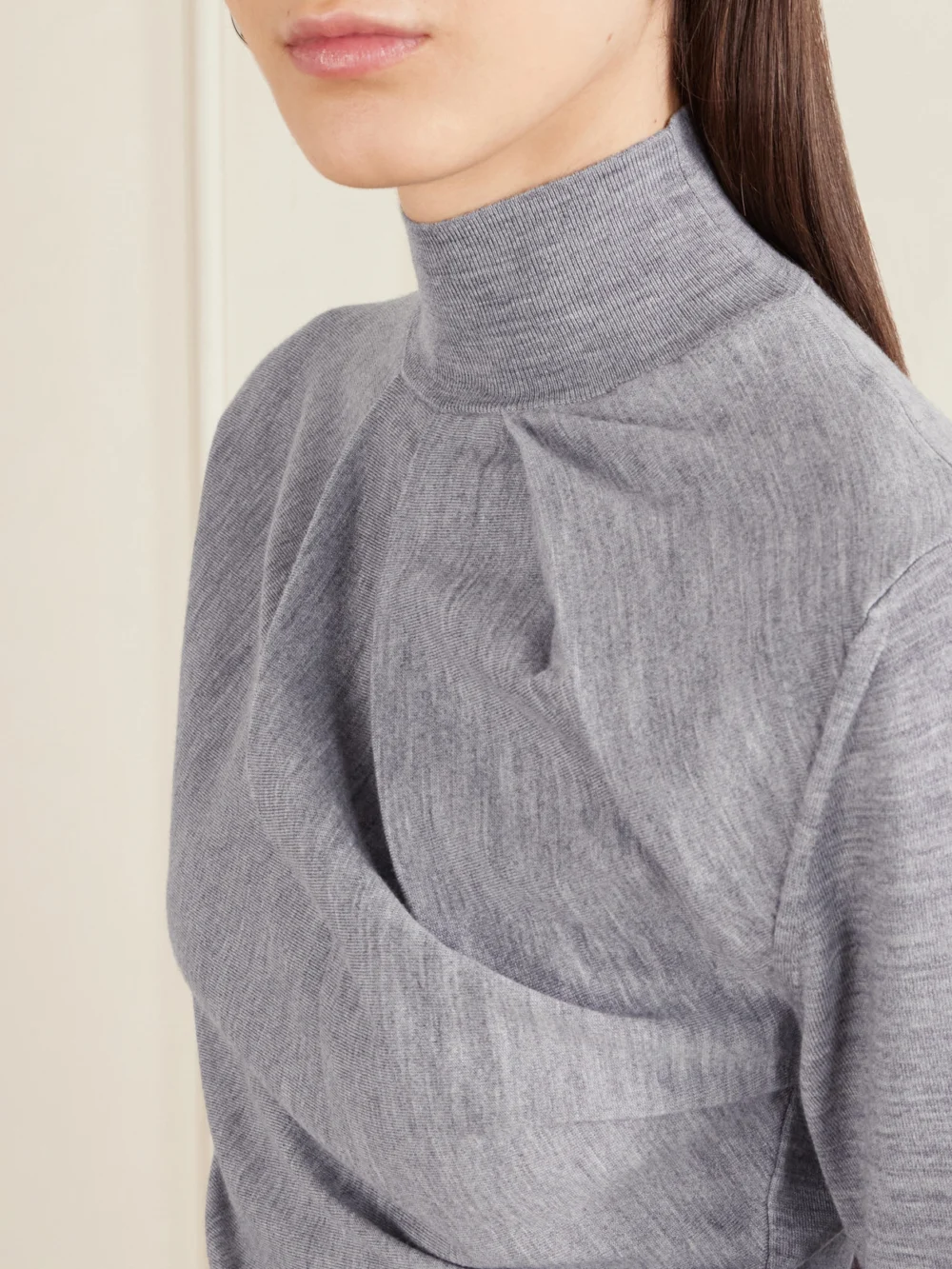 Close-up detail of the Givenchy Draped Wool-blend Turtleneck Sweater