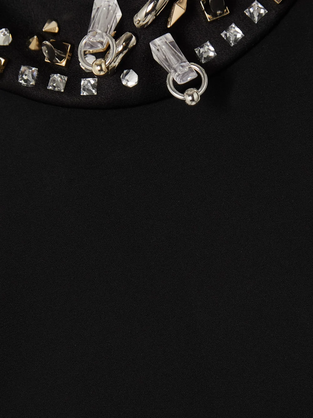 Close-up detail of the Givenchy Embellished Cutout Crepe Dress