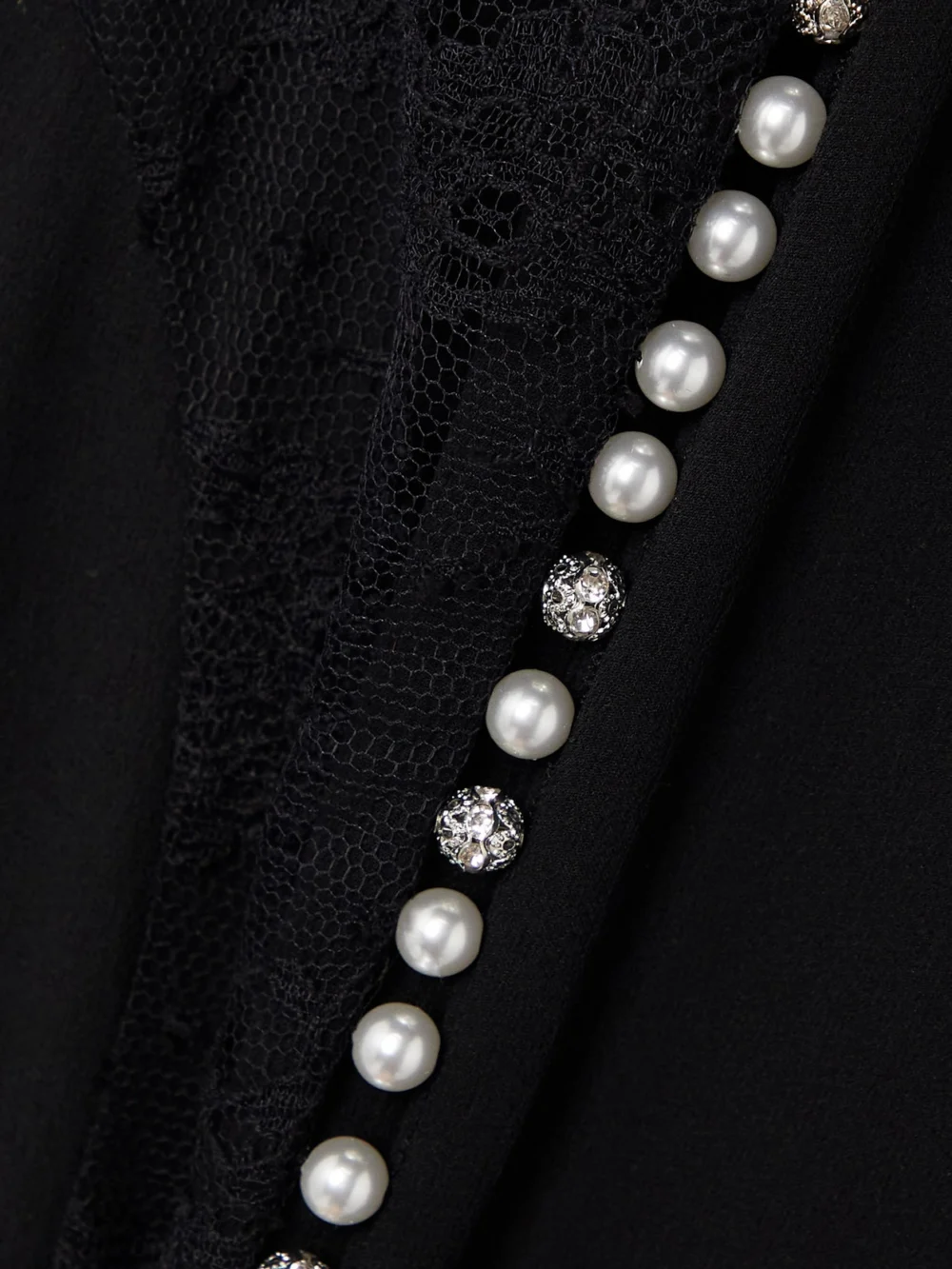 Close-up detail of the Givenchy Embellished Silk-satin, Silk-chiffon and Silk-lace Gown