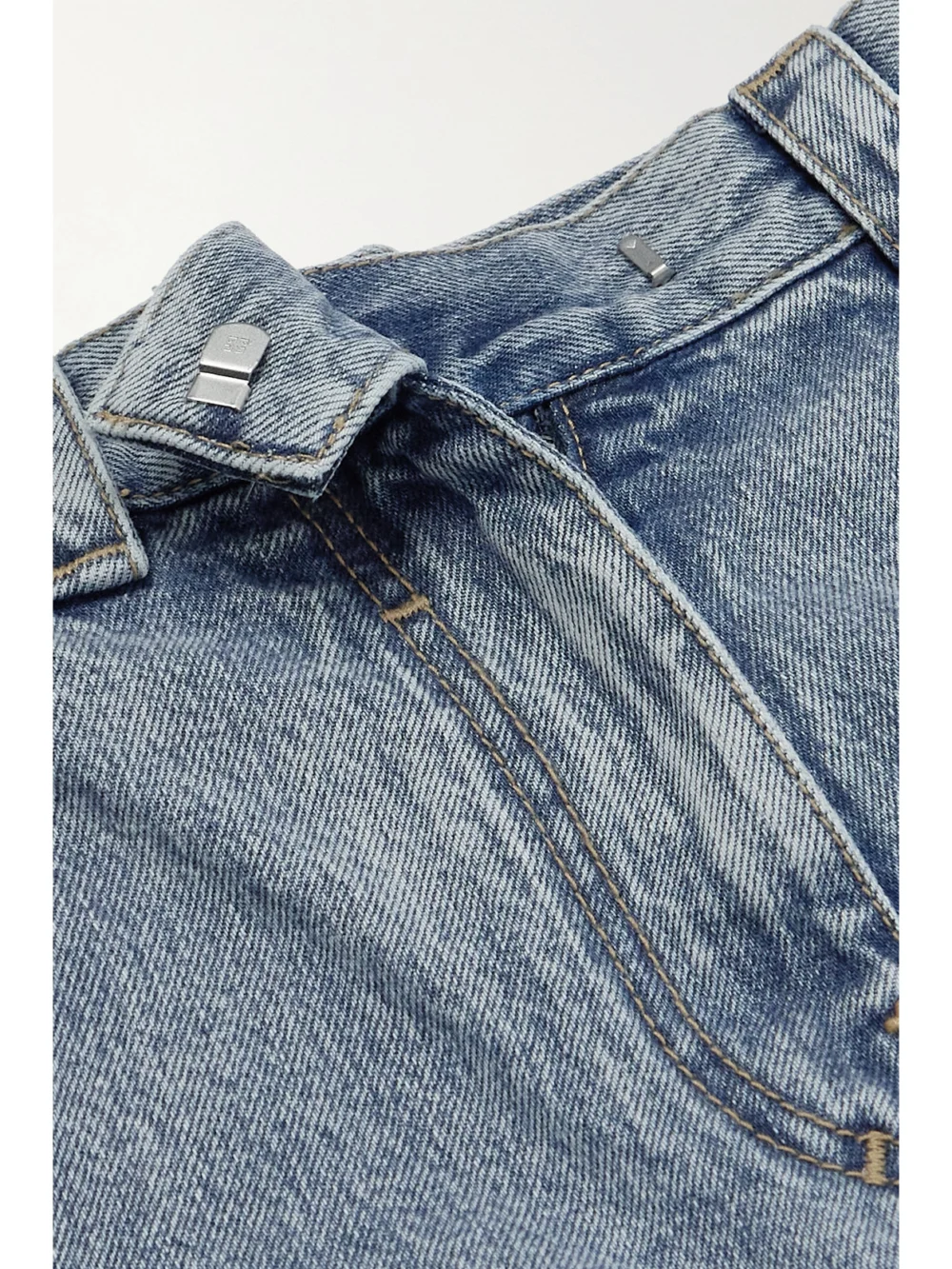 Close-up detail of the Givenchy High-rise Straight-leg Cargo Jeans