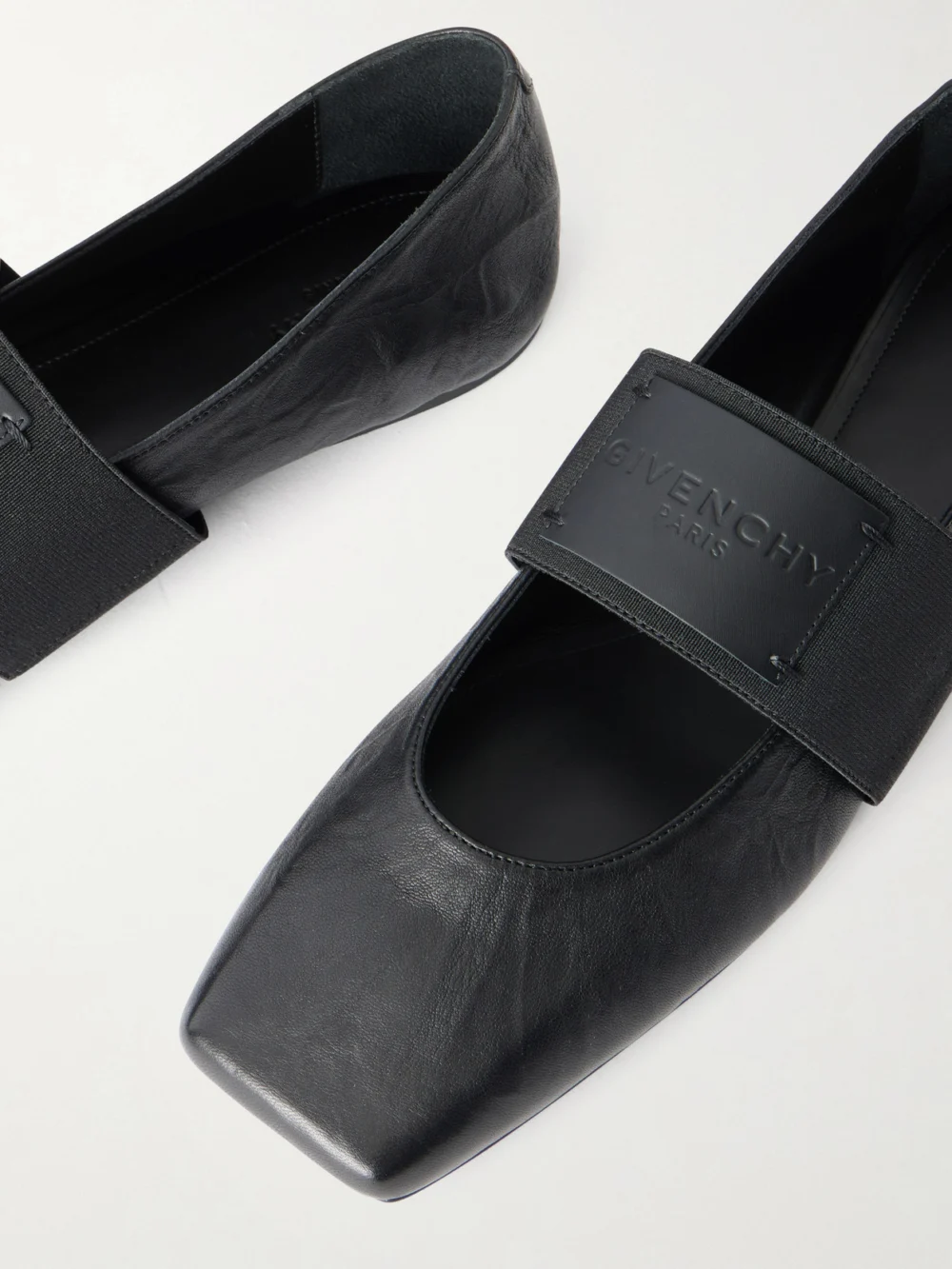 Close-up detail of the Givenchy Logo-appliquéd Leather Ballerina Flats