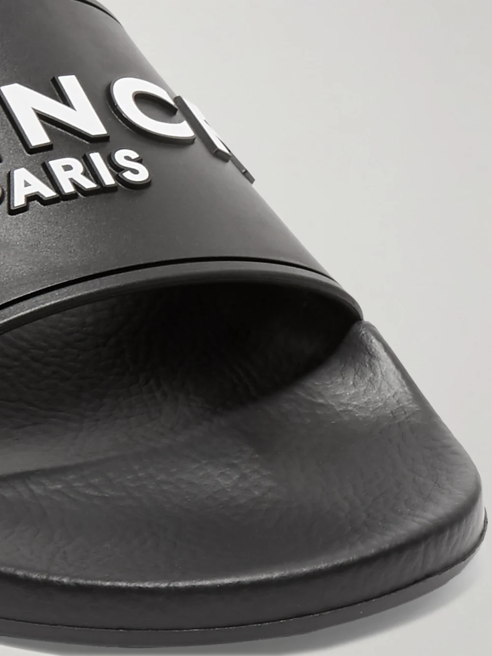 Close-up detail of the Givenchy Logo-print Rubber Slides