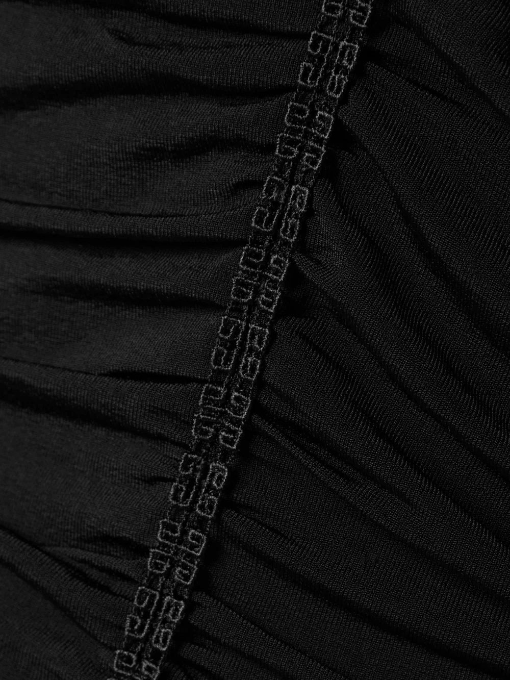 Close-up detail of the Givenchy Off-the-shoulder Ruched Stretch-jersey Top