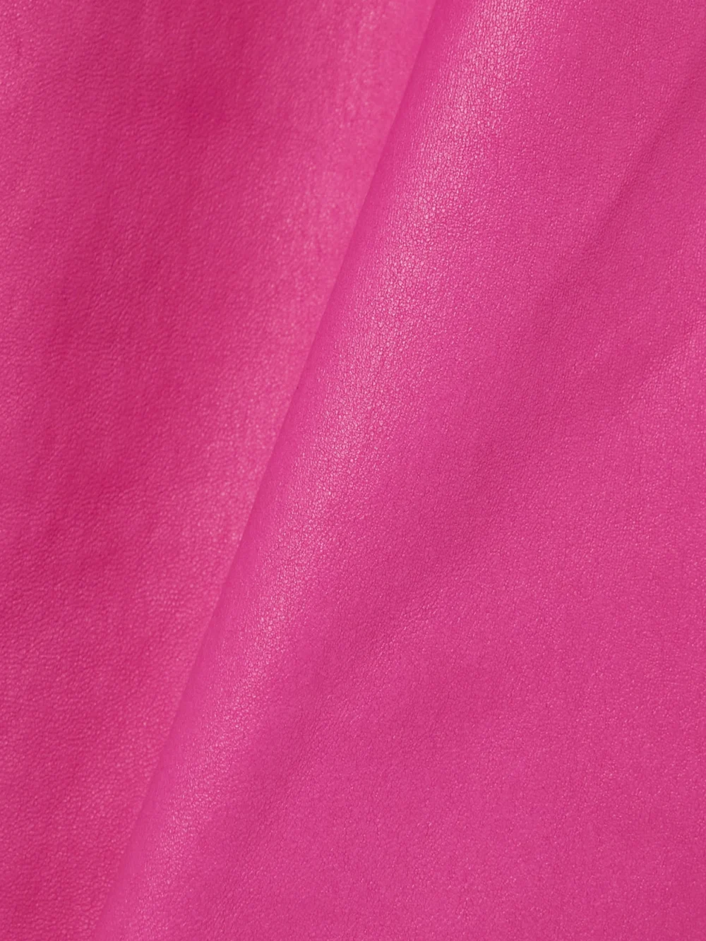 Close-up detail of the Givenchy One-shoulder Cutout Twisted Leather Mini Dress