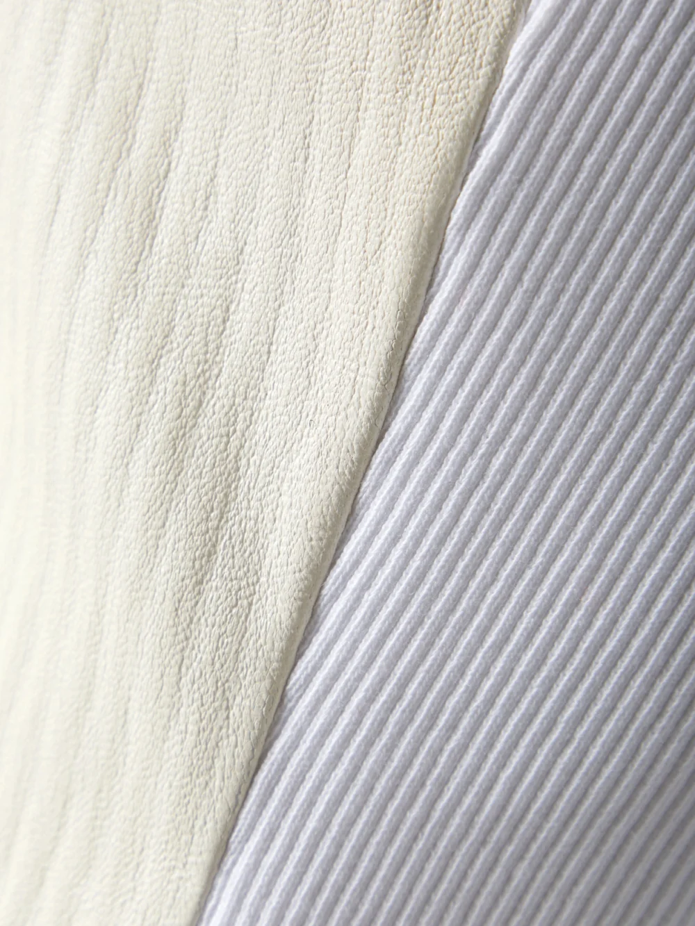 Close-up detail of the Givenchy Paneled Ribbed Leather and Stretch-cotton Jersey Tank