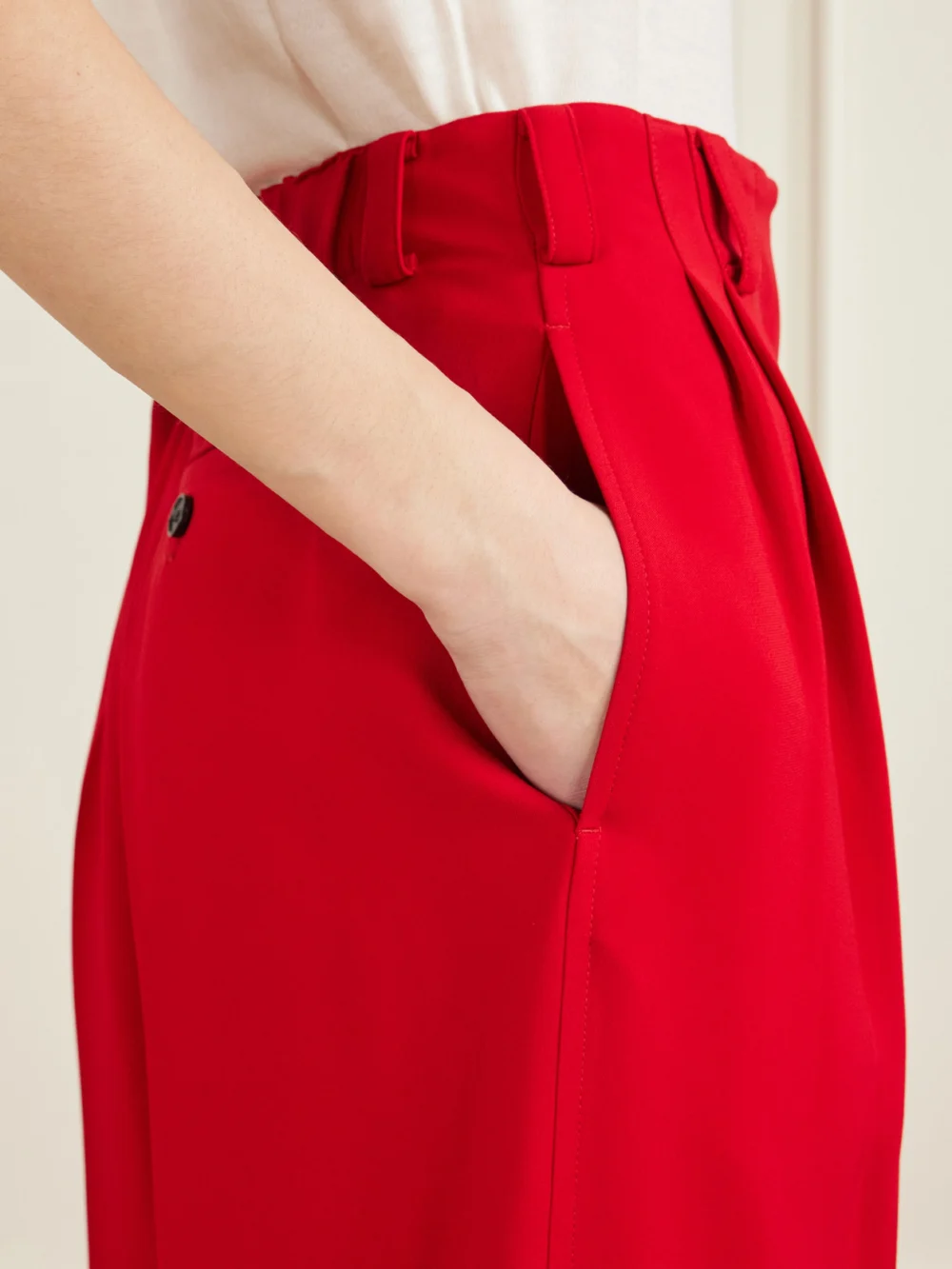Close-up detail of the Givenchy Pleated Crepe Wide-leg Pants