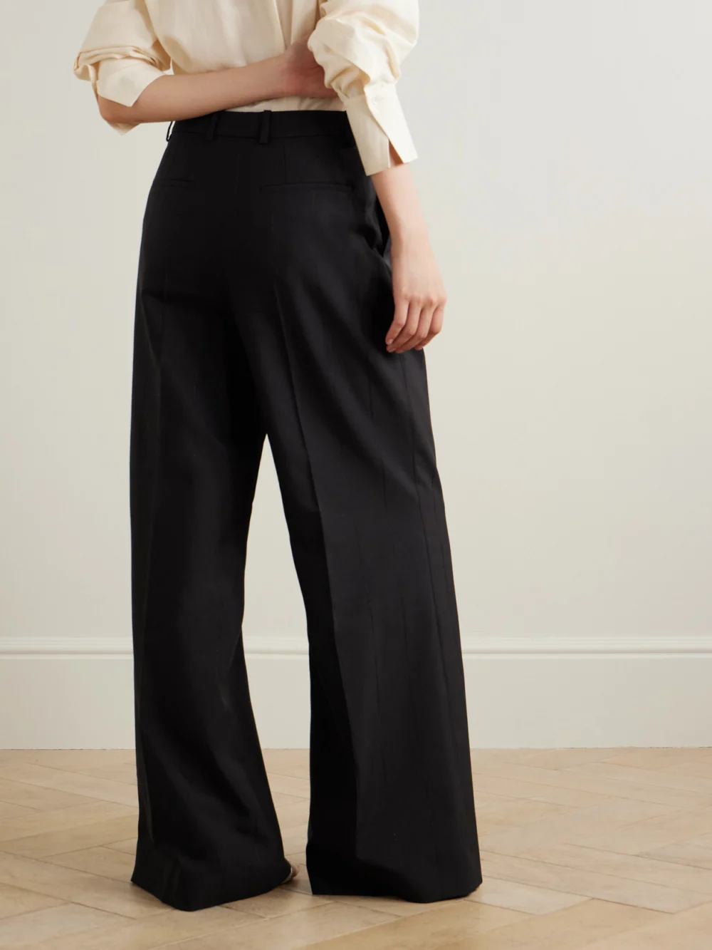 Back view of the Givenchy Pleated Metallic Striped Wool-blend Wide-leg Pants