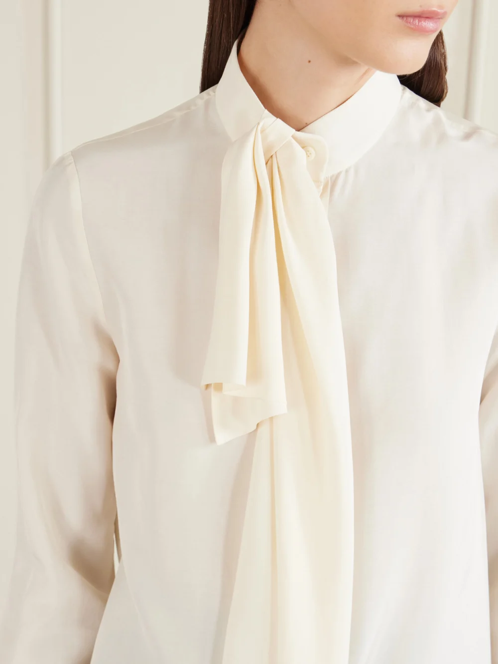 Close-up detail of the Givenchy Pussy-bow Draped Silk Blouse