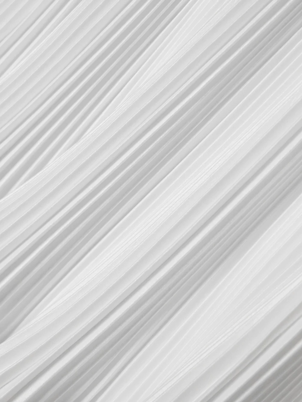 Close-up detail of the Givenchy Ruffled Plissé-satin Mini Skirt