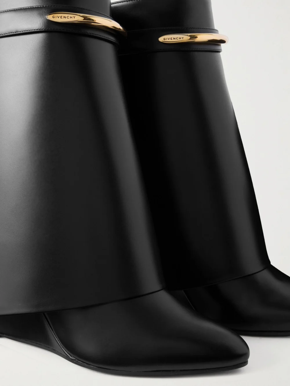 Close-up detail of the Givenchy Shark Embellished Leather Ankle Boots