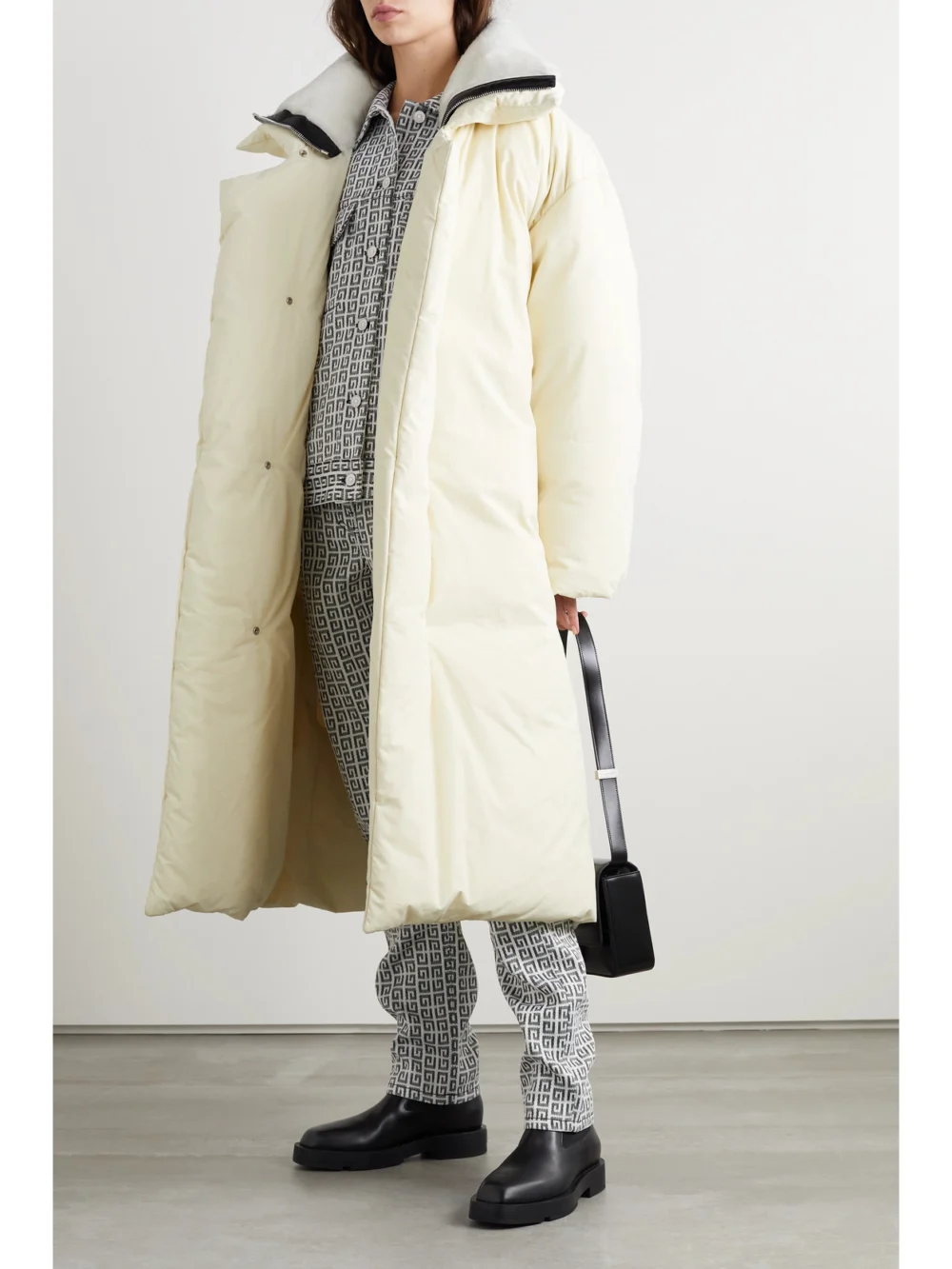 Givenchy Shearling and Leather-trimmed Quilted Cotton Down Coat, worn by a model