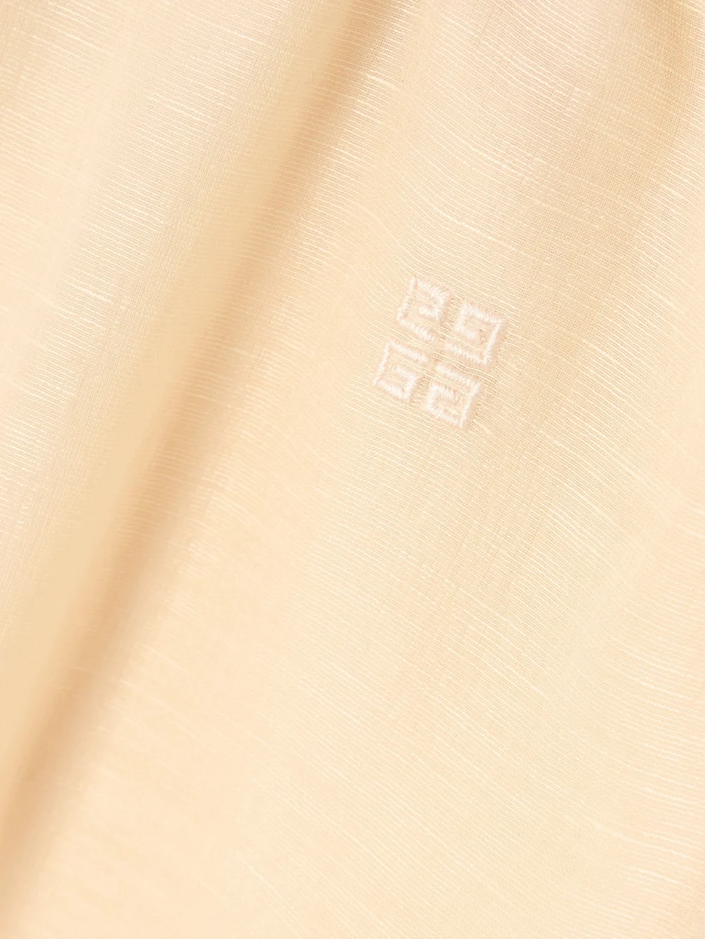 Close-up detail of the Givenchy Silk and Linen-blend Shorts
