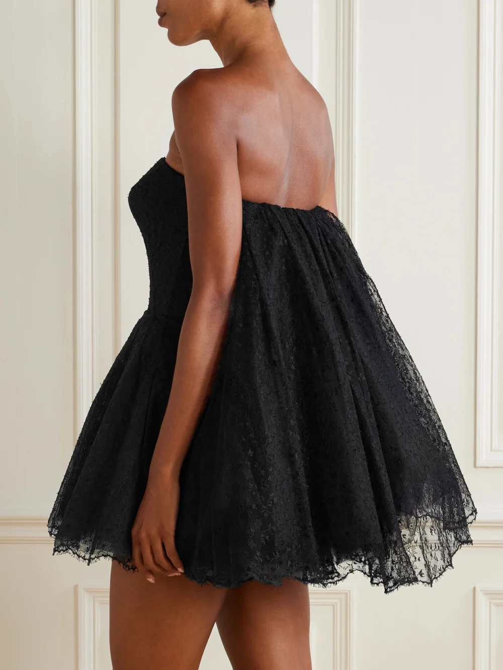 Back view of the Givenchy Strapless Cape-effect Lace Mini Dress