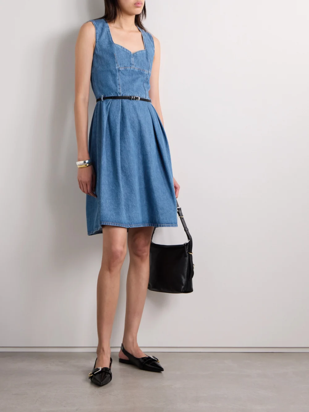 Givenchy Voyou Belted Pleated Satin-trimmed Denim Mini Dress, worn by a model