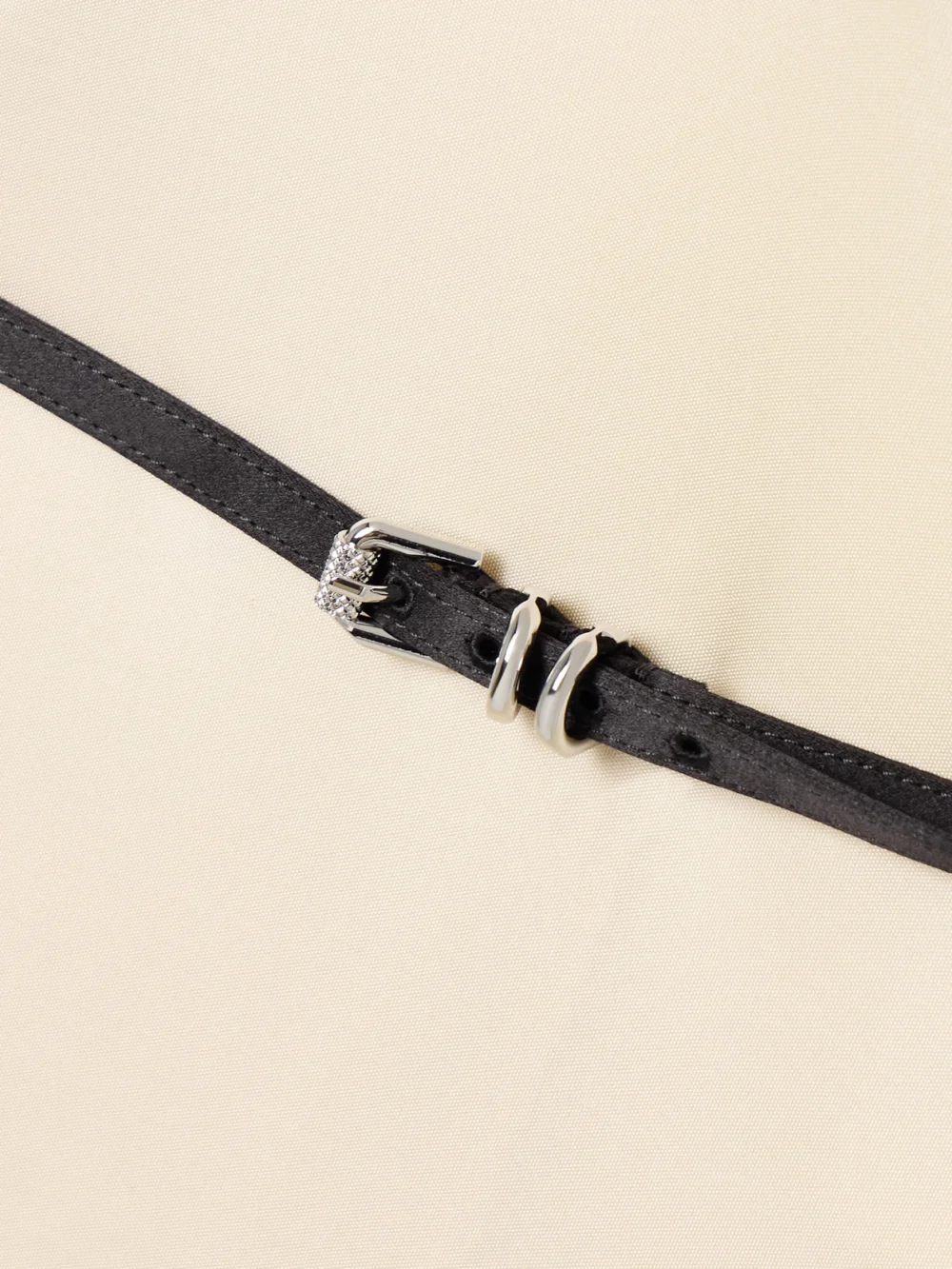 Close-up detail of the Givenchy Voyou Belted Satin-jersey Midi Dress