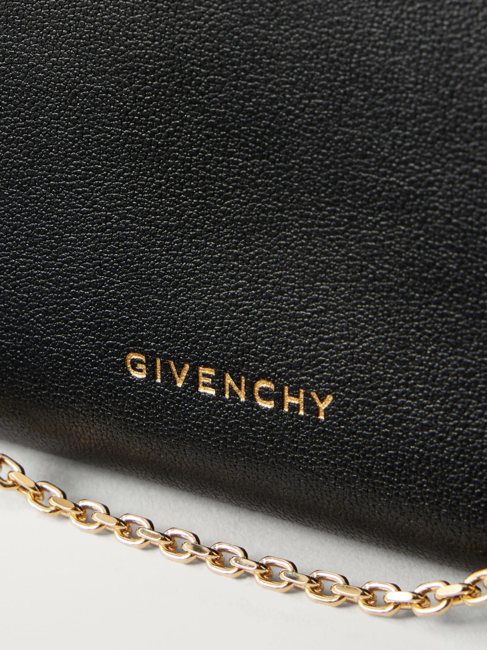 Close-up detail of the Givenchy Voyou Leather Clutch