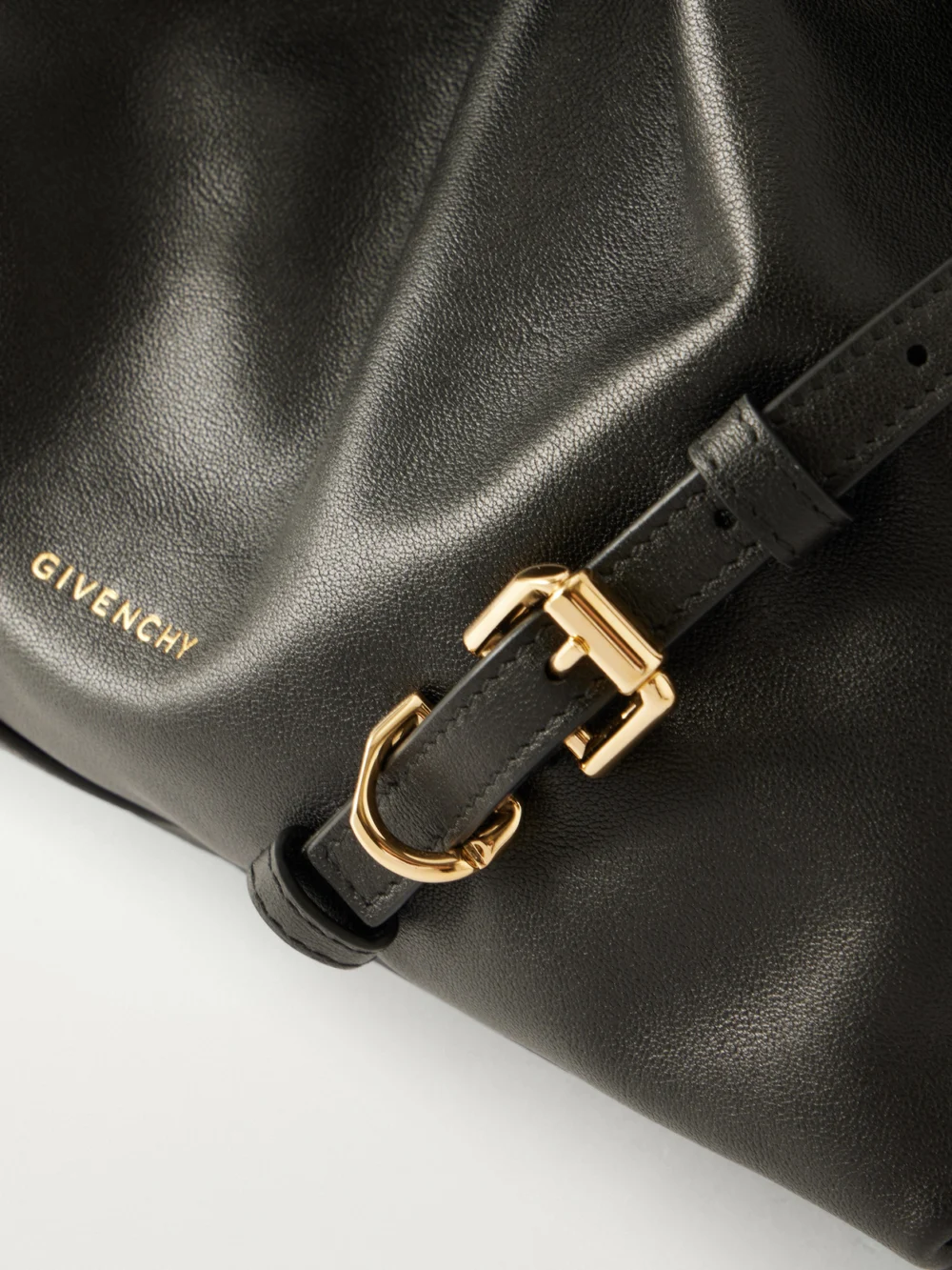 Close-up detail of the Givenchy Voyou Small Embellished Leather Bucket Bag