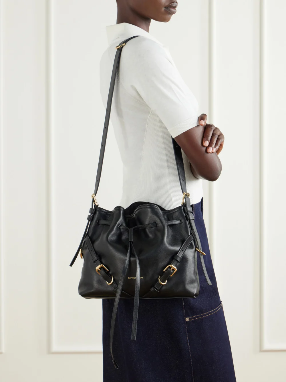 Givenchy Voyou Small Embellished Leather Bucket Bag, styled view