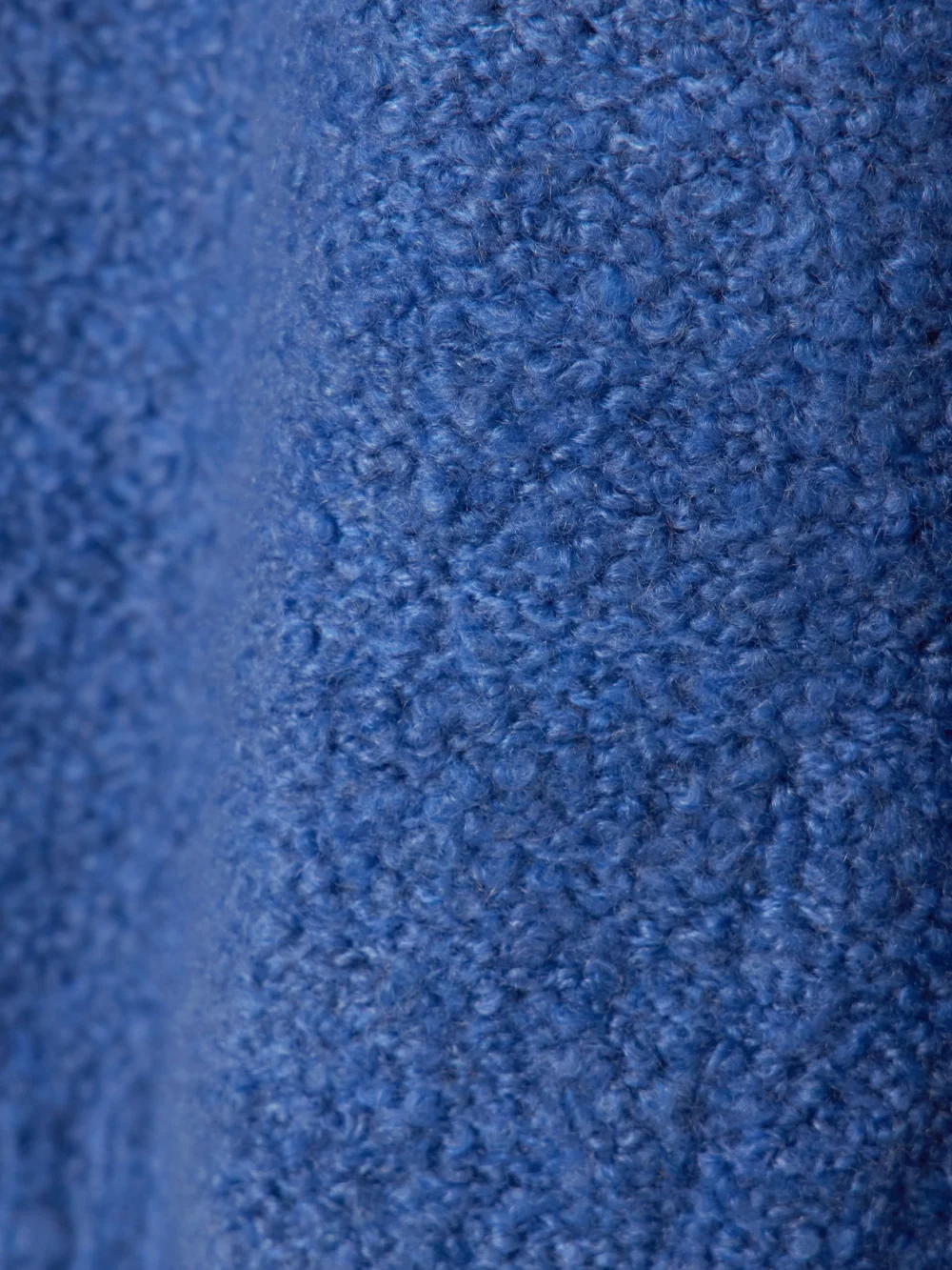 Close-up detail of the God’s True Cashmere Cloud Cashmere-bouclé Sweater