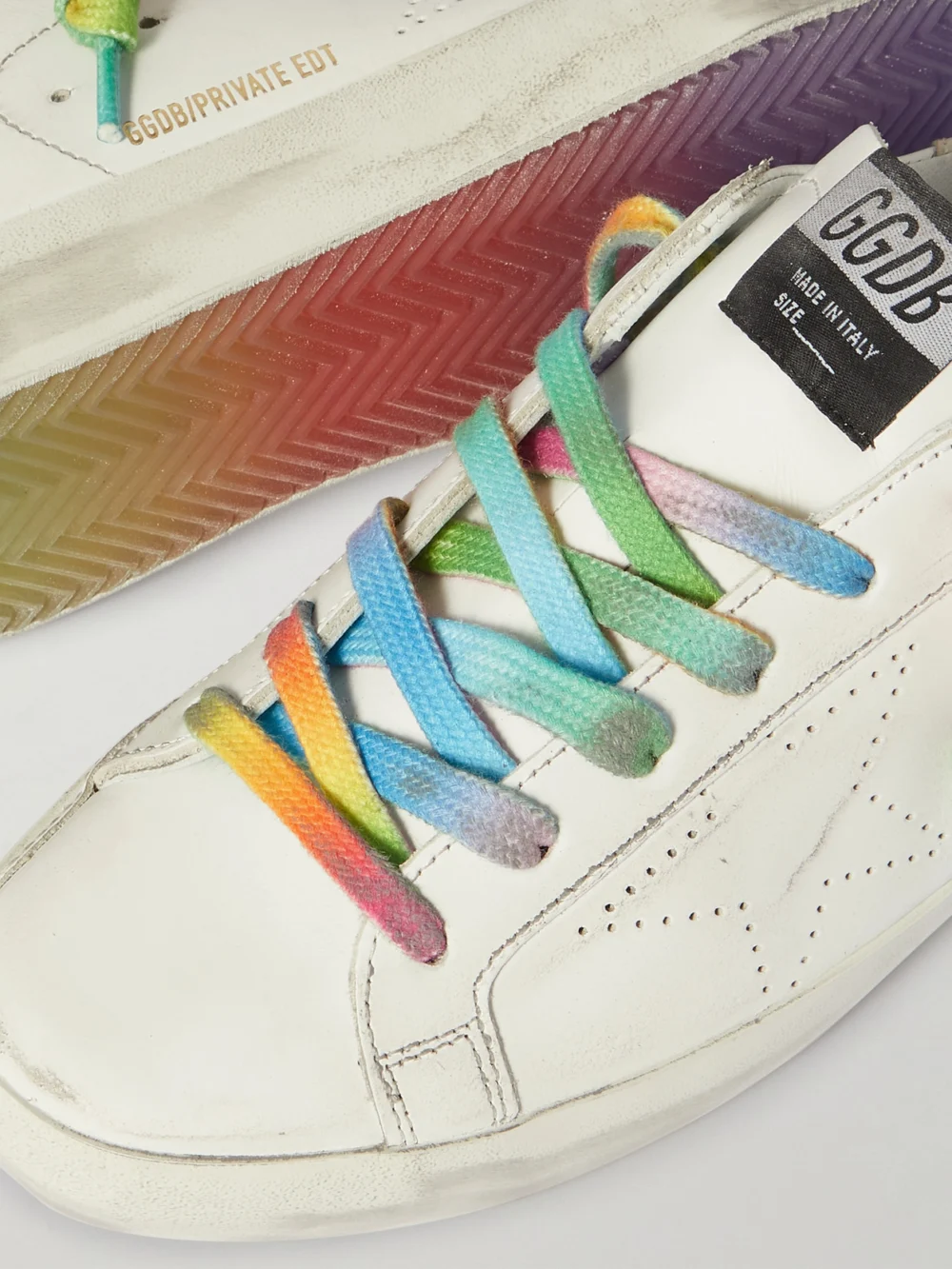Close-up detail of the Golden Goose Superstar Perforated Distressed Leather Sneakers