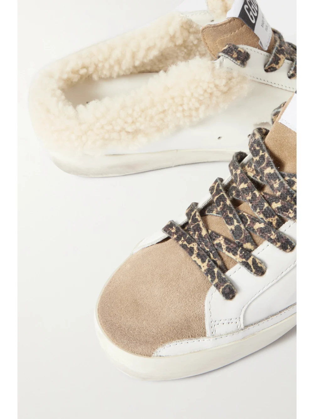 Close-up detail of the Golden Goose Superstar Sabot Shearling-lined Distressed Leather and Suede Slip-on Sneakers
