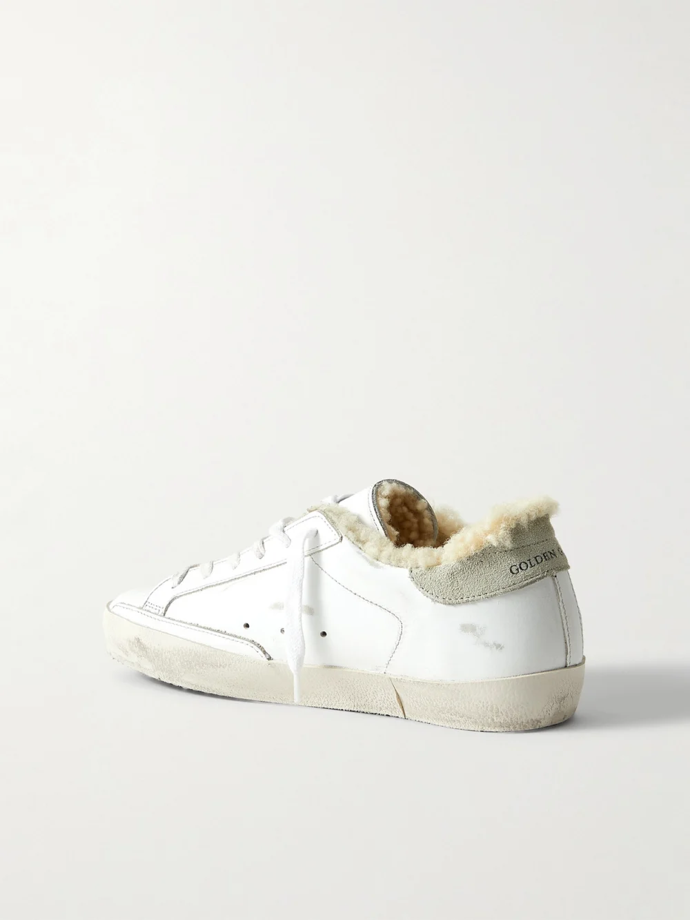 Back view of the Golden Goose Superstar Shearling-lined Distressed Glittered Leather Sneakers