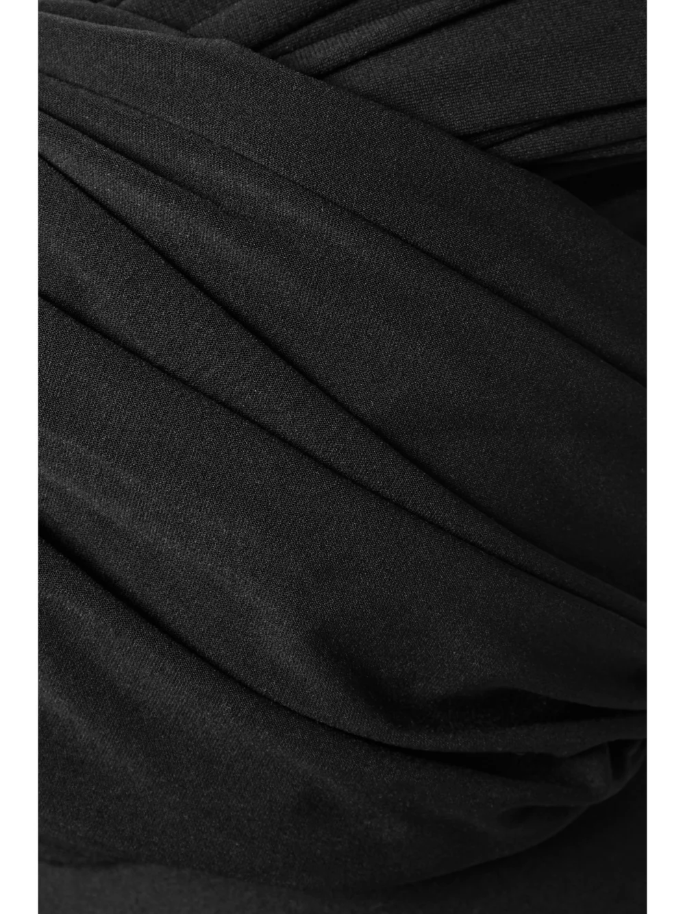Close-up detail of the Goldsign The Odette Off-the-shoulder Twist-front Ruched Stretch-jersey Thong Bodysuit