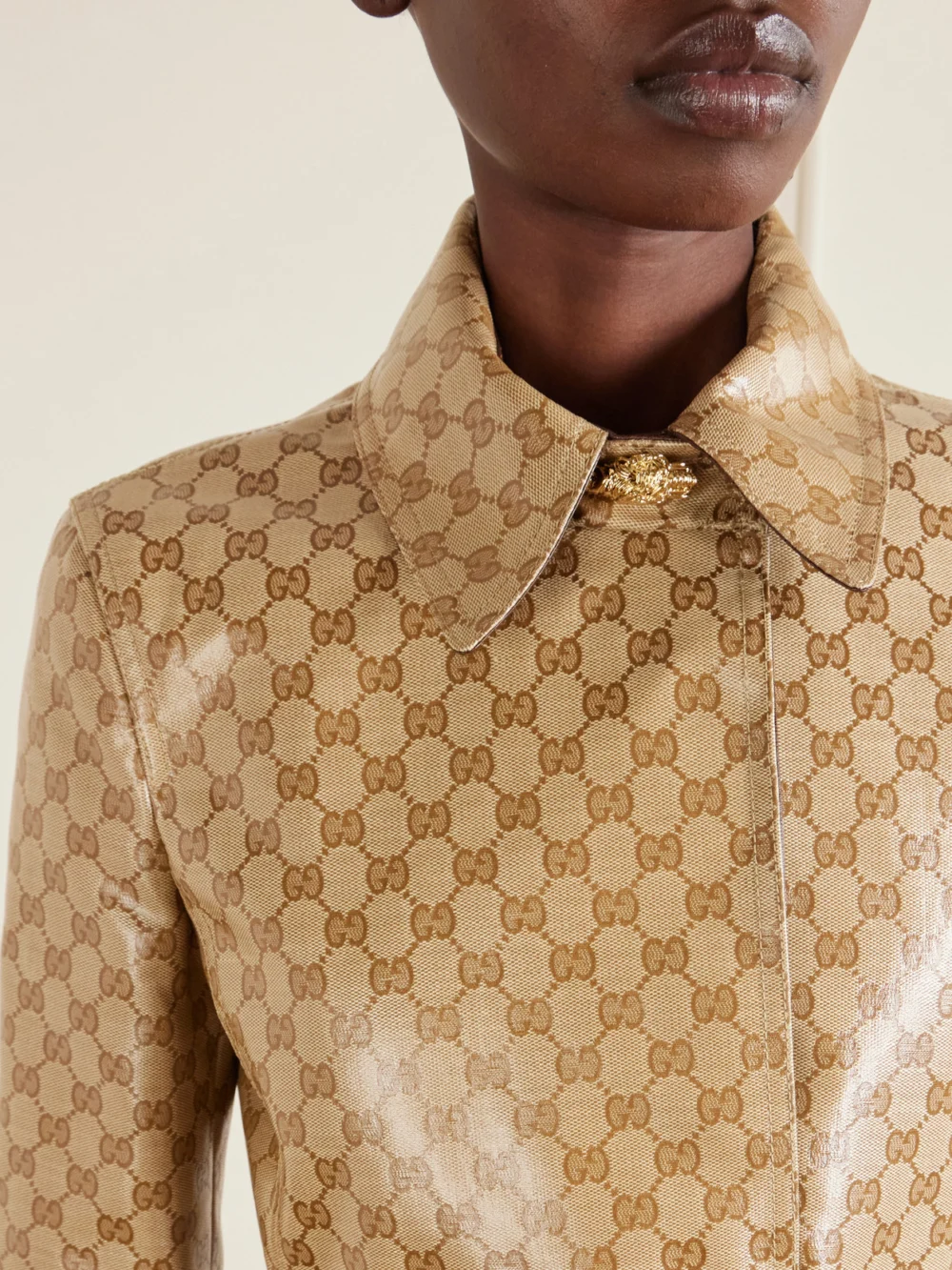 Close-up detail of the Gucci Belted Coated-canvas Trench Coat