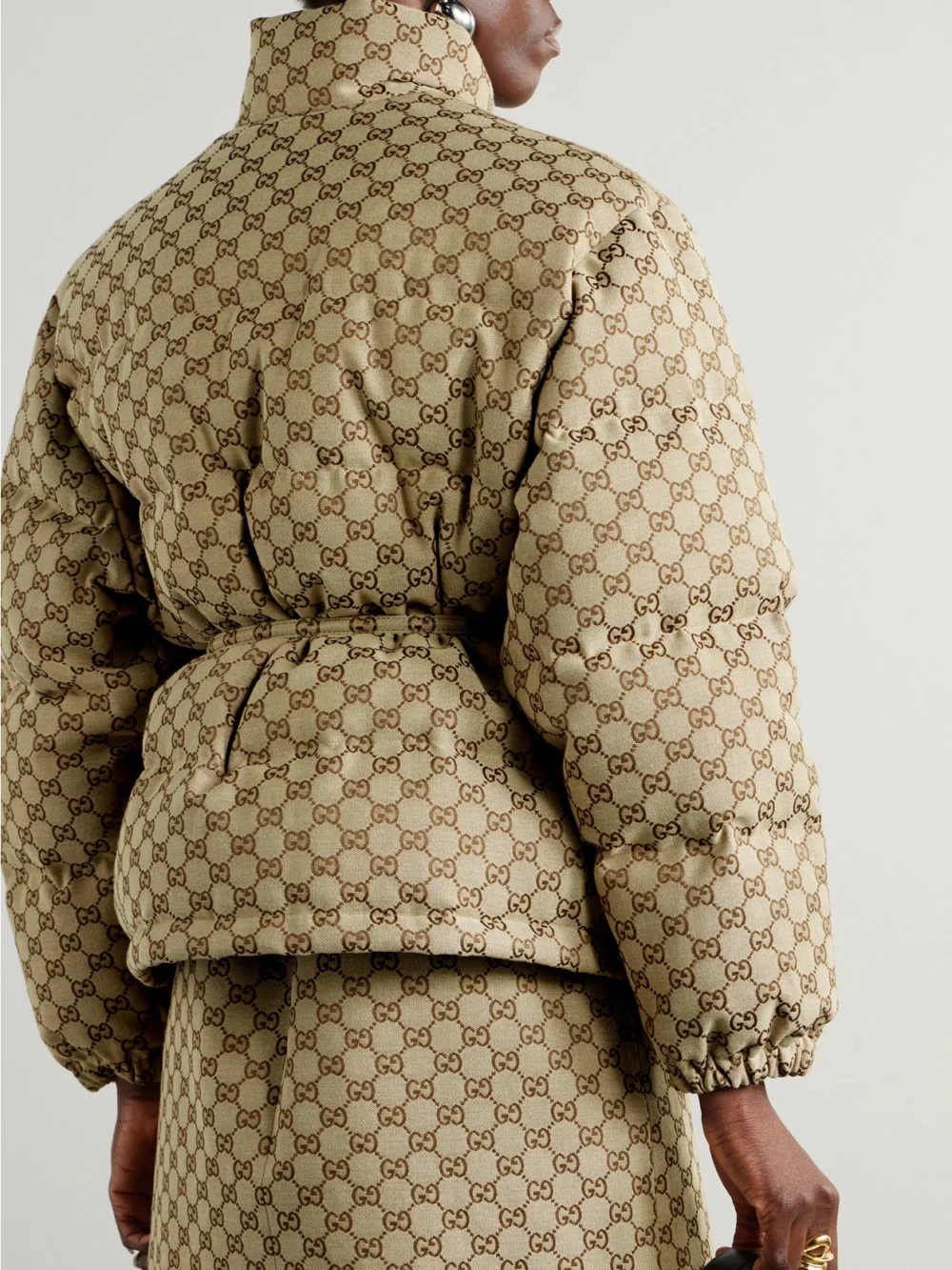 Back view of the Gucci Belted Leather-trimmed Cotton-blend Canvas Down Jacket