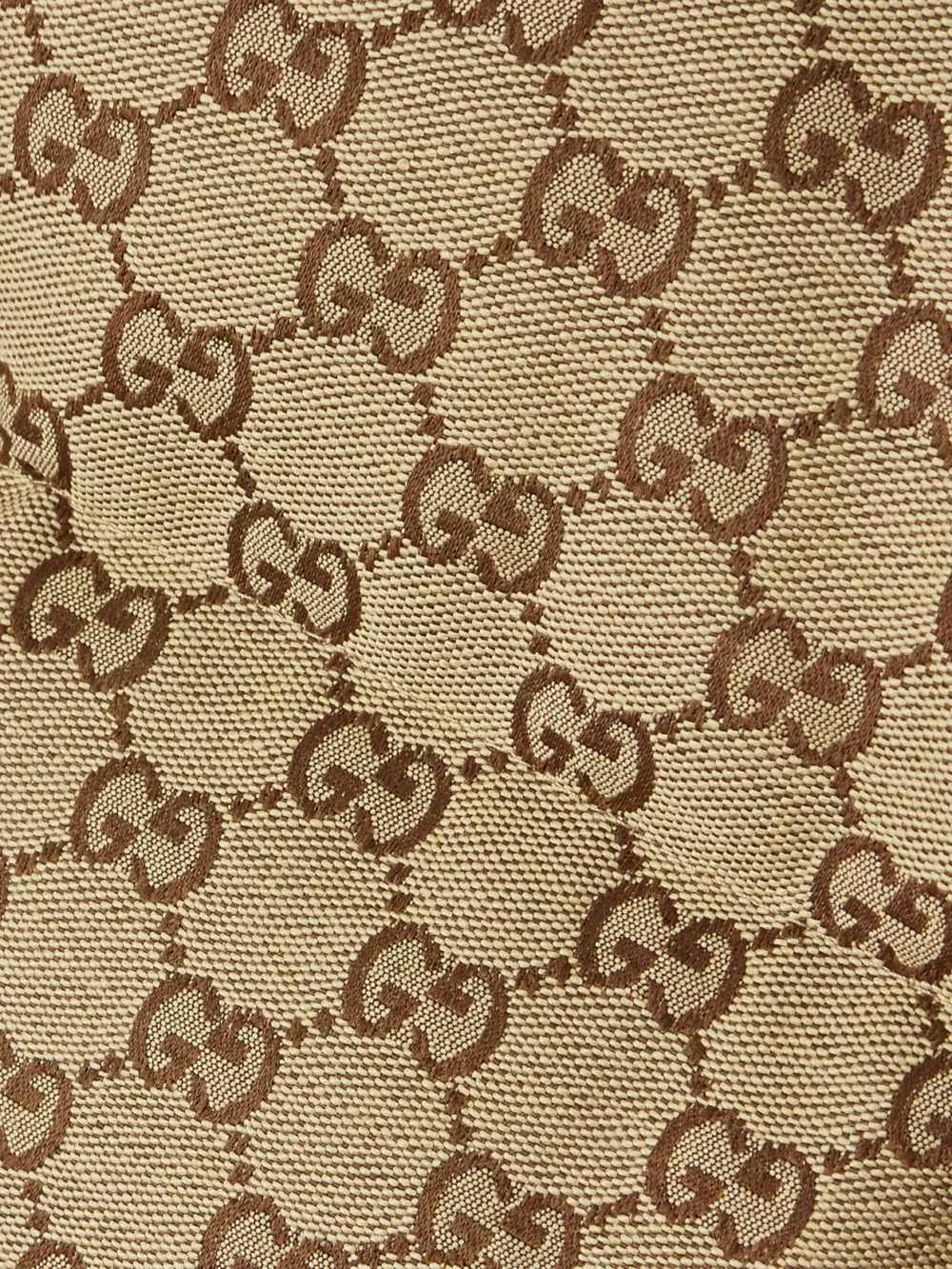 Close-up detail of the Gucci Belted Leather-trimmed Cotton-blend Canvas Down Jacket