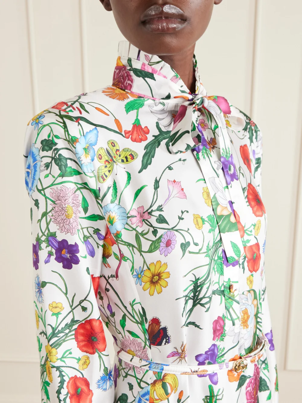 Close-up detail of the Gucci Belted Tie-detailed Pleated Floral-print Silk-twill Maxi Dress