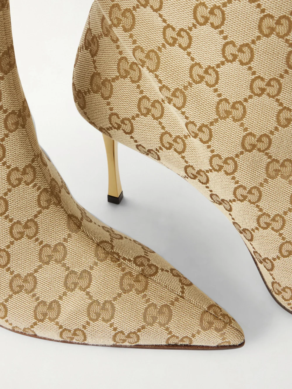 Close-up detail of the Gucci Bombshell Coated-canvas Knee Boots