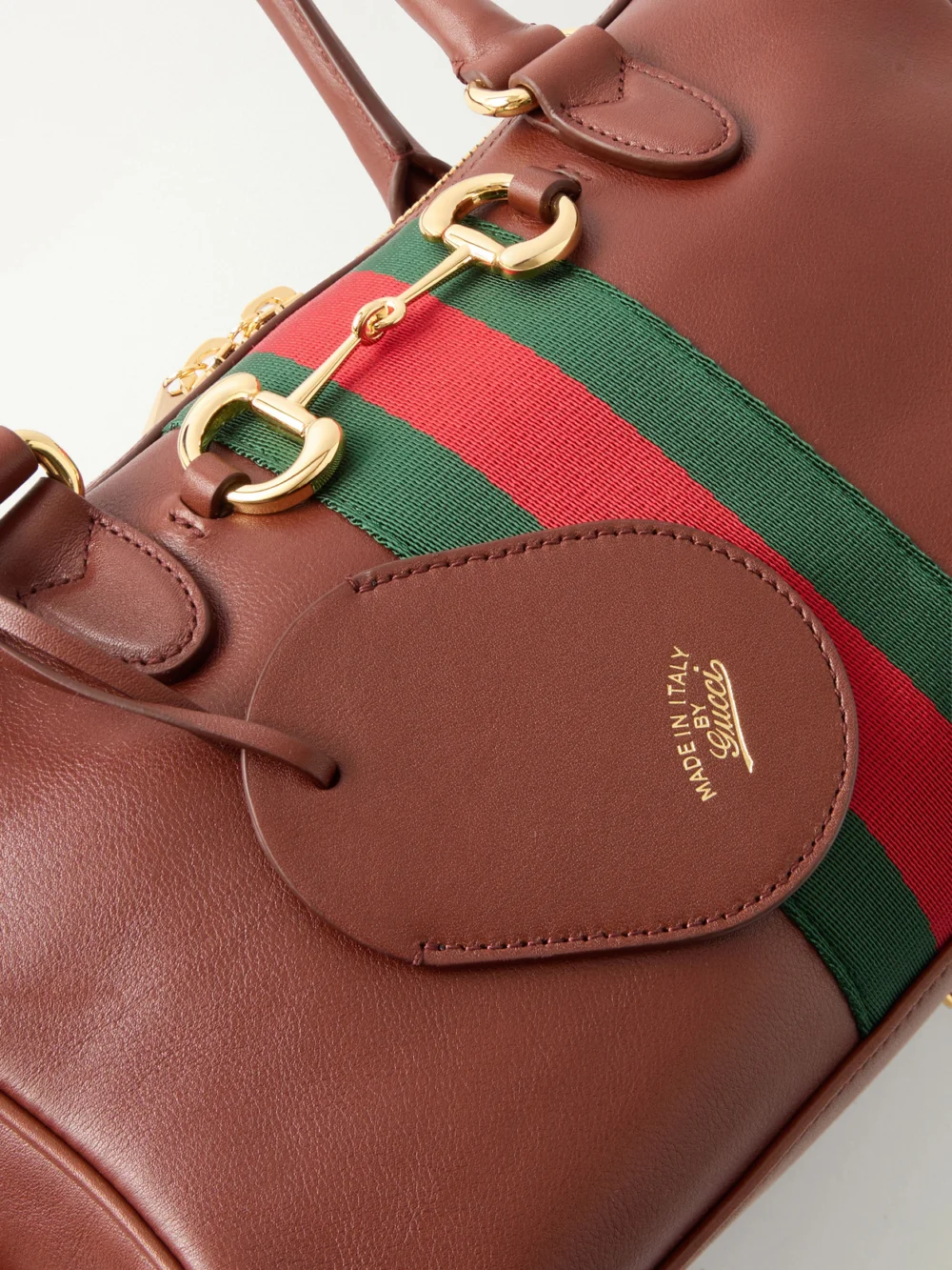 Close-up detail of the Gucci Borsetto Small Webbing-trimmed Leather Shoulder Bag