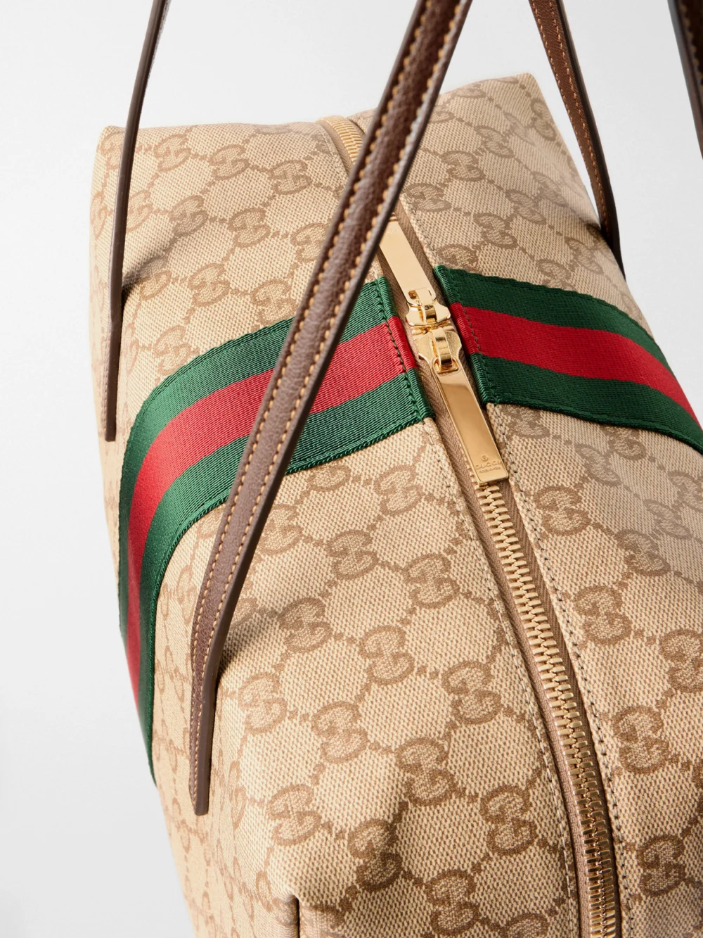 Close-up detail of the Gucci Boston Leather-trimmed Coated Canvas-jacquard Shoulder Bag